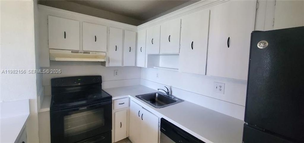 Photo of 5861 NW 16th Pl #309, Sunrise, FL 33313 (MLS # A11982156)