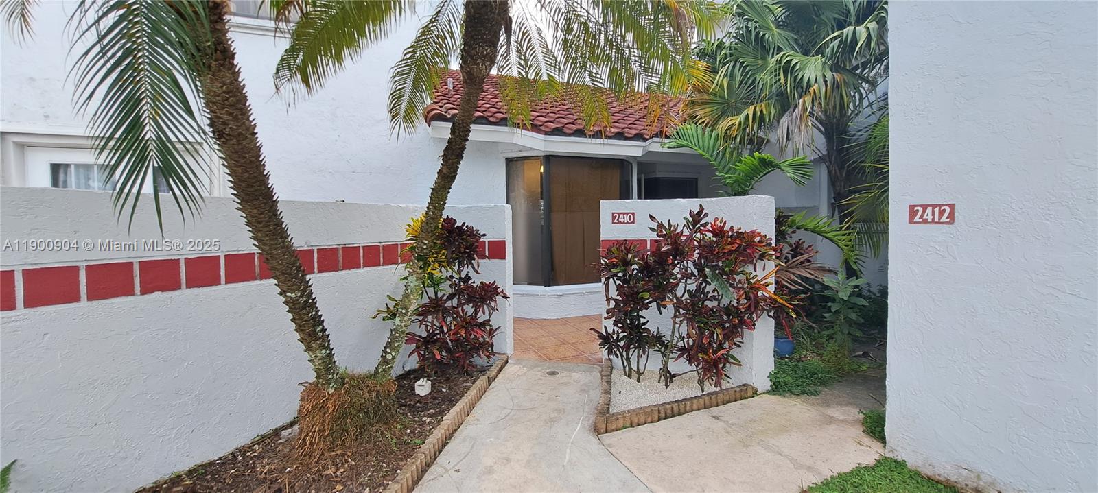 Discover Your Serene Retreat. This rarely available corner townhome offers a bright, spacious floor plan with 3 bedrooms, 2 full bathrooms, and a tranquil, lush tropical garden. Enjoy seamless indoor-outdoor living with a lovely enclosed screened patio, perfect for relaxing or entertaining. Modern baths and generous closet space complement the spacious, open kitchen. With a roof built just last year, you can have complete peace of mind for years to come. Nestled in a quiet corner of San Remo, this home is a perfect gem, offering the best of Homestead living with great local restaurants and nearby attractions like the Florida Keys Outlet Marketplace and the Florida Keys.