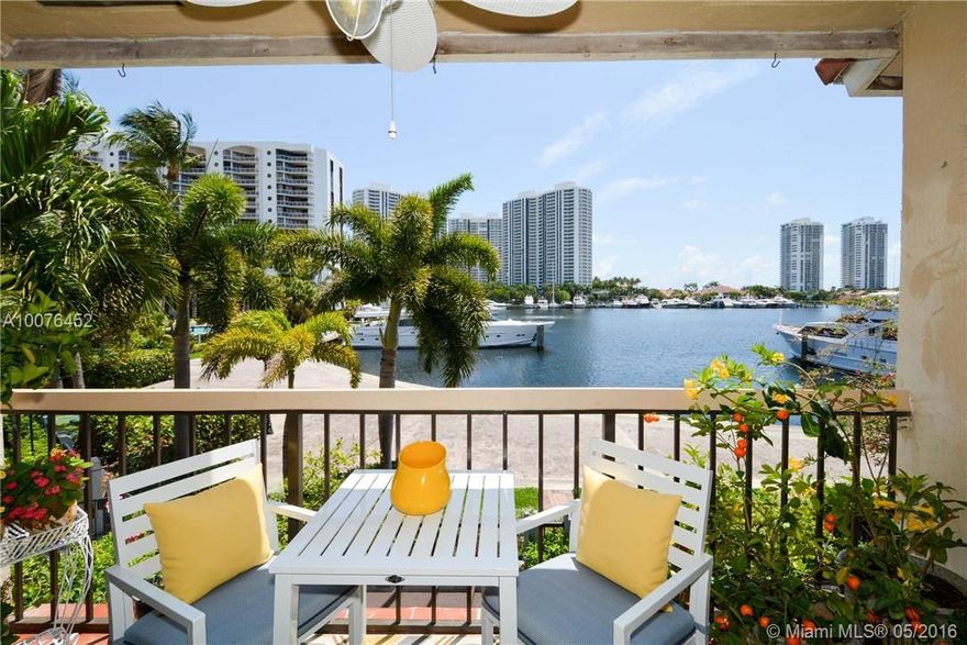 Beautiful marina views from this open floor plan La Mirage town home in highly sought Aventura.  Enter through a lush tropical garden with custom impact glass door. Wake up to gorgeous sunrise bay views from master suite with balcony. On suite with Jacuzzi/Air Tub. Screened covered patio. Bedrooms have vaulted ceilings with walk in California Closets. Designer kitchen with pullouts & pantry. SubZero refrigerator, Hurricane Shutters. Walk to Waterways Shops ,dog park, & park for kids. Boat slips available!