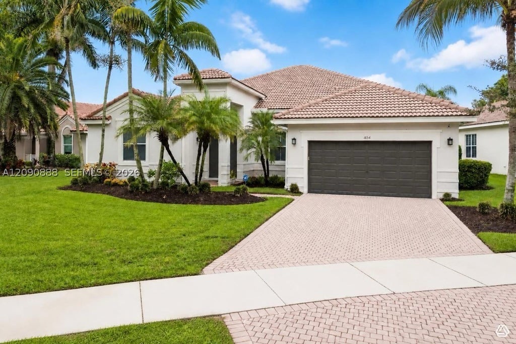Photo of 1654 Bunting Ln, Weston, FL 33327 (MLS # A12090888)