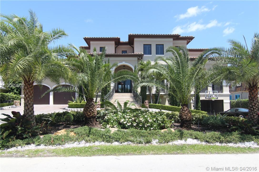 Spectacular and extraordinaire Jewel ! 2012 built with all the luxurious and finest detailed appointments thruout!Situated on the best street & wide waterway, only seconds from open bay! Imposing double volume height entry!Elegant living and dining! Lavish master suite. Immense open terraces. Addl media room, sauna & gym. Dream kit, wet bar. Full summer kitchen w/smoke grill. Inviting open saline pool/spa. 80'concrete/epic dock with davits and lift! Lavish in everyway! Yachts/fishermen's dream! Glorious!
