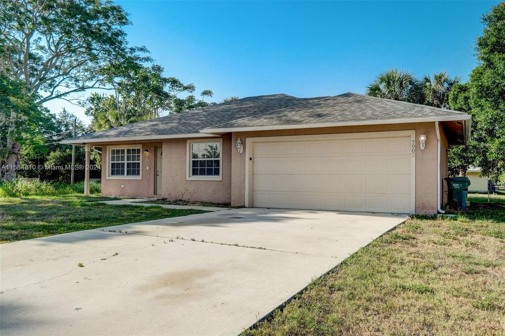 Photo of 7902 Pacific Ave, Fort Pierce, FL 34951 (MLS # A11584810)