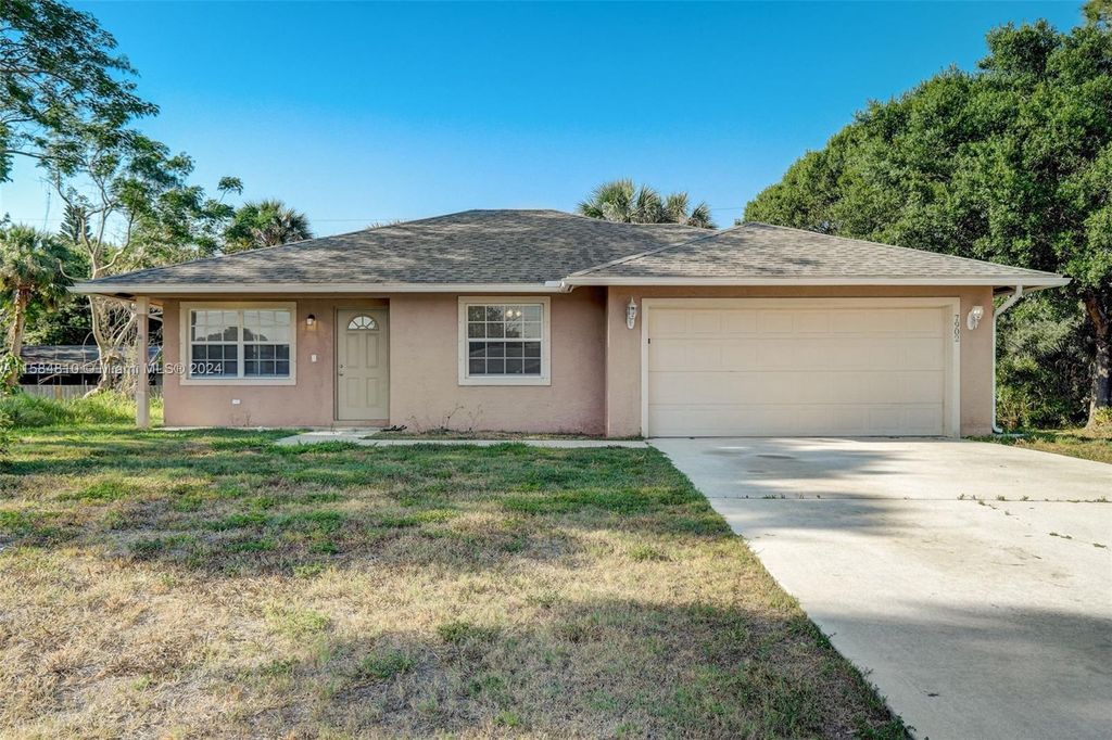 Photo of 7902 Pacific Ave, Fort Pierce, FL 34951 (MLS # A11584810)