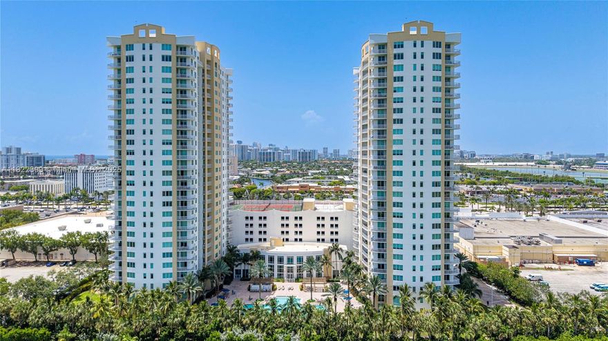 Live luxuriously in this 2-bed, 2-bath DUO condo, Hallandale Beach. Bright open-concept layout with expansive windows and high ceilings. Spacious master, largest in complex, with walk-in closet and spa-like en-suite. Premium finishes: marble floors, granite counters, crown molding, solar shades. Two parking spaces on same level offer ease of access and extra security. Enjoy the heated pool, spa, fitness center w/sauna and steam rooms, tennis, billiard room, theater, 24/7 security, valet parking and much more. Walk to shops, groceries, coffee, fitness, doctor’s offices, churches, and Diplomat Golf, Tennis, & Pickleball Club. Beaches 0.7 miles away. Ideally located between Miami and Fort Lauderdale to enjoy all South Florida has to offer!
