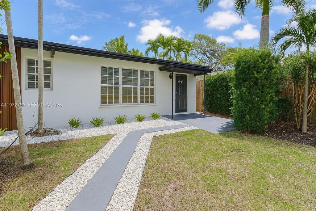 Photo of 1399 NE 38th St, Oakland Park, FL 33334 (MLS # A11972796)