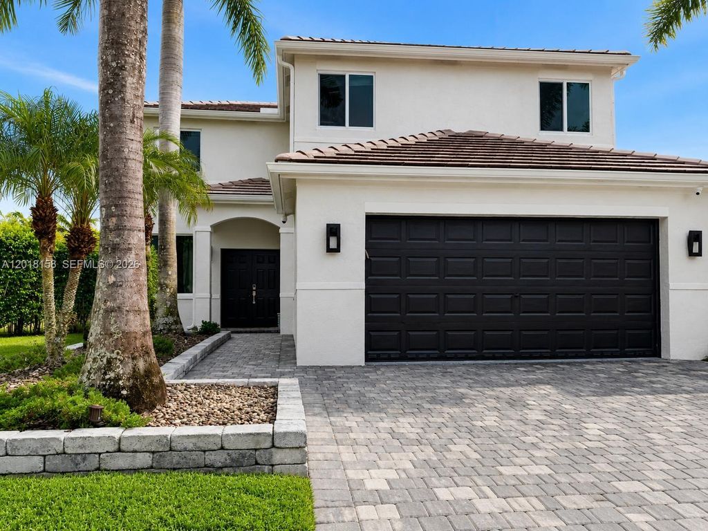 Photo of 709 Bald Cypress Rd, Weston, FL 33327 (MLS # A12018158)