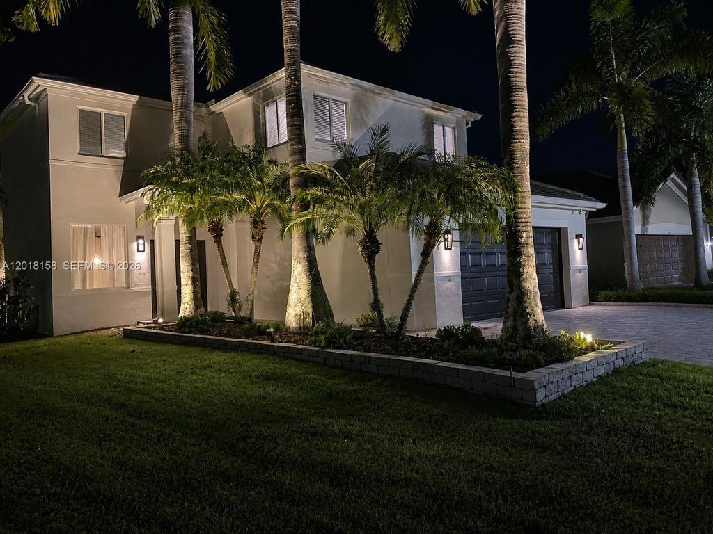 Photo of 709 Bald Cypress Rd, Weston, FL 33327 (MLS # A12018158)