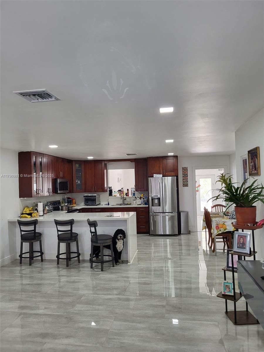 View photos, virtual tours, details... 1650 NE 147th St