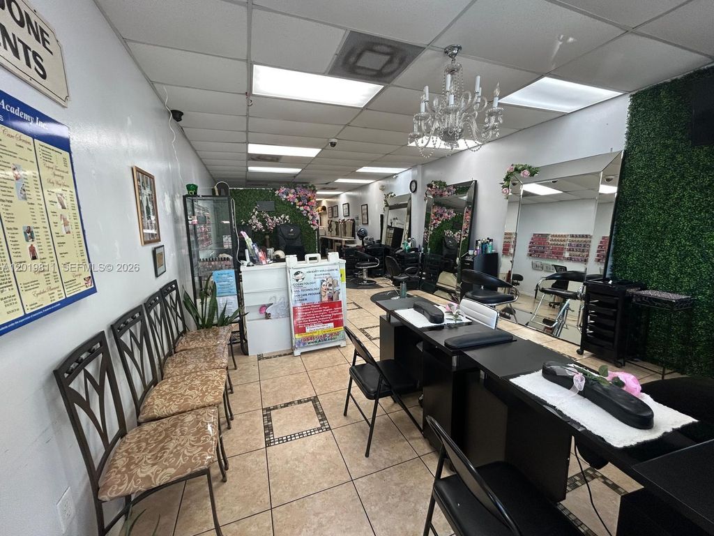 Photo of 6630 Stirling Rd, Davie, FL 33024 (MLS # A12019811)