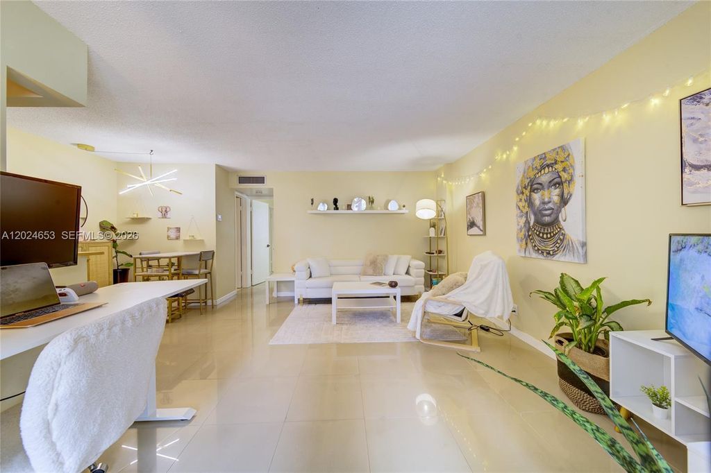 Photo of 1040 SE 4th Ave #128, Deerfield Beach, FL 33441 (MLS # A12024653)