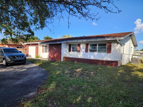 Single Family Residence in Pembroke Pines FL 1711 109th Ave Ave 1.jpg