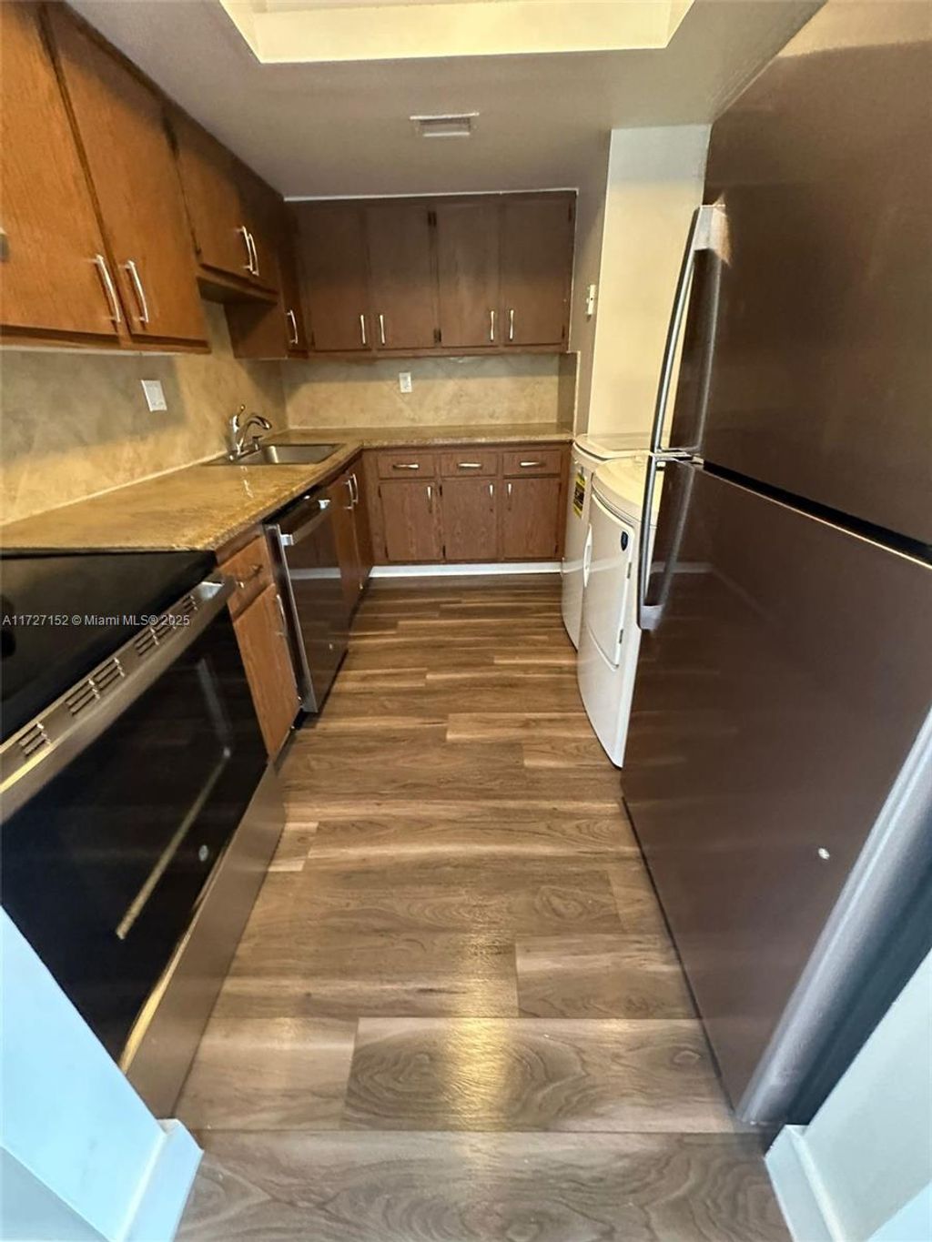 Photo of 2140 NW 57th Ave #13-E, Lauderhill, FL 33313 (MLS # A11727152)