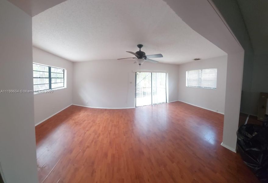 Home Available NOW for rent! This 3/2 is a must see. Open concept home with generously sized bedrooms. Home also features a den and large screened in back patio. Corner lot. One car garage.