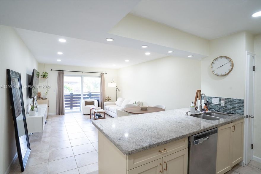 Welcome to this fully remodeled condo at Dadeland Capri, ideally situated on the highest floor for added privacy, better views, and abundant natural light. This unit features a spacious open-concept floor plan, ideal for modern living. The kitchen is equipped with granite countertops, wood cabinetry, and stainless steel appliances, and all windows have been upgraded to impact glass for enhanced security and energy efficiency. The main living areas are finished with tile flooring, while the bedroom features laminate floors. Enjoy a large balcony that fills the space with natural light. For added convenience, the unit includes an in-unit washer and dryer. Community amenities include a pool and fitness center. Ideally located just behind Dadeland Mall, with easy access to the Palmetto Expressway and SR 878. Schedule your showing today!