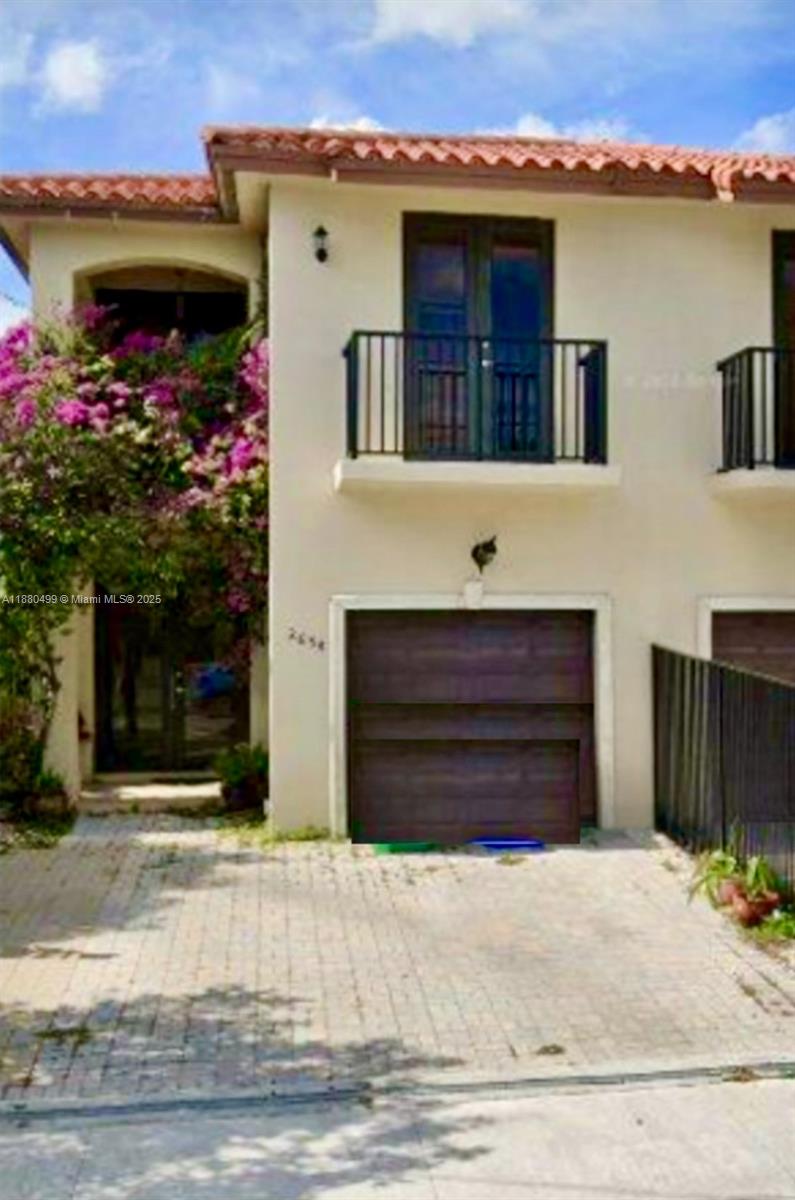Centrally located in the Mater Grove area, this stunning two-story townhome is a rare blend of luxury, convenience, & value. Featuring 3 spacious bedrooms, 2.5 baths, a 1-car garage with ample storage & enhanced security, a private mini pool for refreshing relaxation, it's perfect for families, couples, or professionals. Romantic Romeo and Juliet-style balconies add charm, while the open floor plan showcases elegant travertine marble floors throughout & warm cherrywood floors in the bedrooms. A laundry room with additional storage. This home is located in a desirable/walkable location near Brickell, Coconut Grove, Coral Way, & Coral Gables, making it practical and desirable. With the owner relocating, this is a fantastic opportunity to own a beautifully designed home at a great price.
