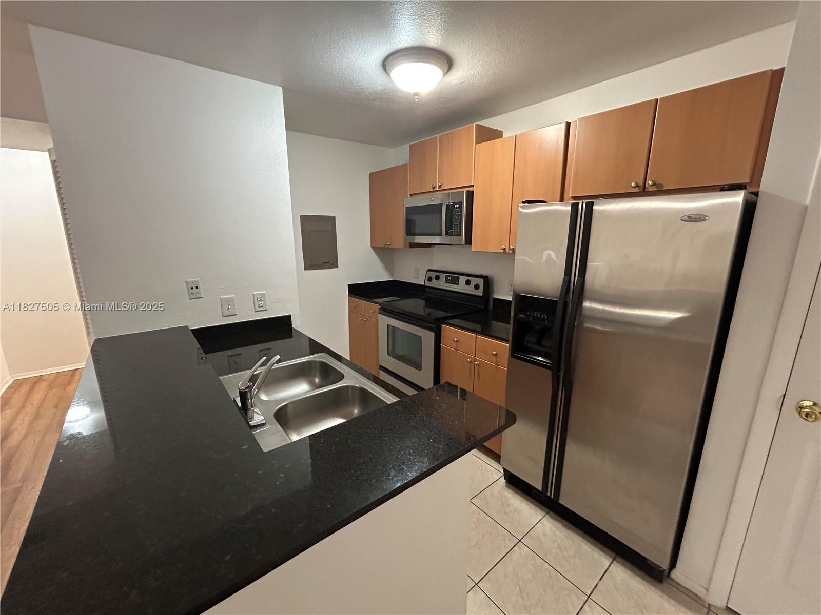 BEAUTIFULLY UPGRADED 1 BEDROOM, 1 BATH CONDO ON SECOND FLOOR IN VERANO AT DELRAY. TILE FLOORS IN KITCHEN AND BATH, LAMINATE IN LIVING ROOM AND BEDROOM, GRANITE COUNTERS, WOOD CABINETS AND STAINLESS STEEL APPLIANCES IN KITCHEN NEWER WASHER DRYER IN UNIT. WATER/SEWER INCLUDED. ALL AGES COMMUNITY, CLOSE TO I-95, DINING AND SHOPPING. ONE PET ALLOWED, MAX 35 LBS, NO AGGRESSIVE BREED ($250 NON-REFUNDABLE PET FEE APPLIES FOR OWNER). REQUIRES TOTAL OF 3 MONTHS OF RENT TO MOVE IN (1st/last/deposit). ASSOCIATION APROVAL TAKES 2 to 3 WEEKS. (rush fee is also available) ***600 and up credit necessary***