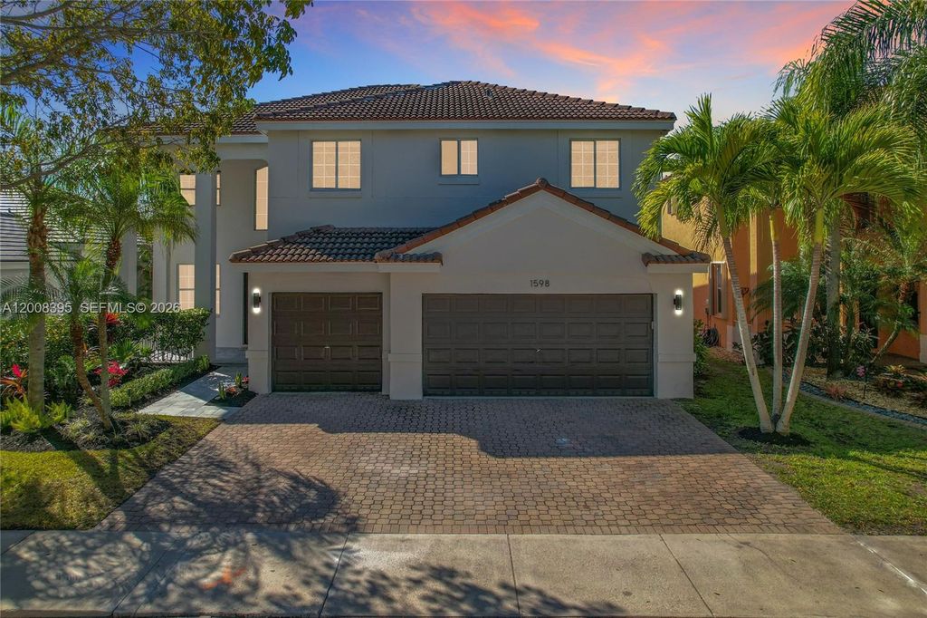 Photo of 1598 Sandpiper Cir, Weston, FL 33327 (MLS # A12008395)