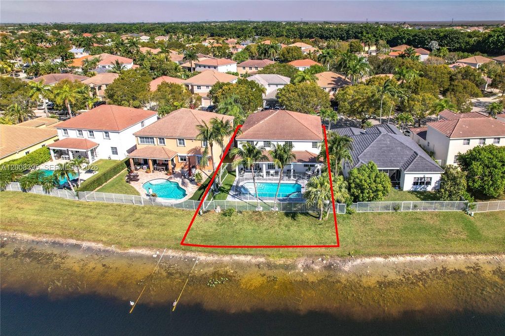 Photo of 1598 Sandpiper Cir, Weston, FL 33327 (MLS # A12008395)