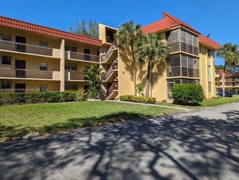 Photo of 3390 Foxcroft Rd #C212, Miramar, FL 33025 (MLS # A11869315)