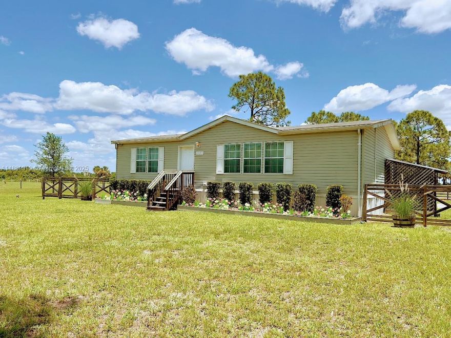 Escape to your own private ranch—just about 1.5 hours from Miami or under an hour from Fort Myers! Tucked away on 18.75± acres, this secluded property is fully fenced and cross-fenced, offering plenty of space and flexibility. The property includes a 2-bedroom, 2-bath 2012 manufactured home (sold furnished), two ponds, a pole barn, storage shed, and a large, screened shed with electric. Zoned Rural Residential, the land welcomes horses, livestock, and even allows for additional homes on each 2.5-acre parcel—making it an ideal setting for a family compound or multi-home retreat.