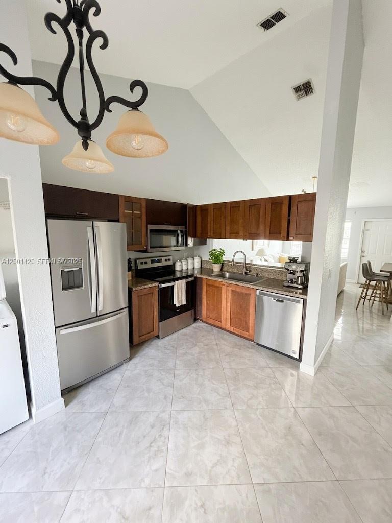 Photo of 7431 Tam Oshanter Blvd #7431, North Lauderdale, FL 33068 (MLS # A12001420)