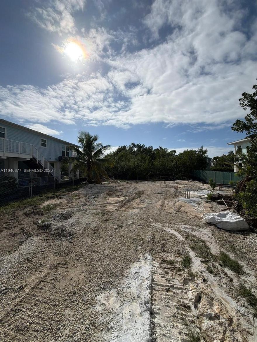 ROGO and Building permit in hand! allows for immediate construction 6,000sq.ft lot on Ramrod Key, 60 feet of waterfront canal with quick access to ocean. Permit approved al Monroe County for a 1,400 sq.ft CBS 3 bedroom, 2.5 bath residence. Connected to water and sewer on site. ACOE and DEP mitigation paid. Permit for dock and lift submitted.
Correct address: 27378 JAMAICA LN RAMROD KEY, FL 33042