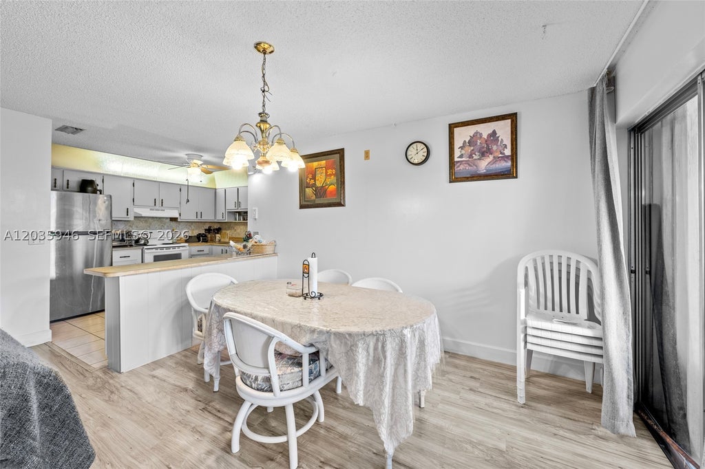 Photo of 5839 La Pinata Blvd #C-2, Green Acres, FL 33463 (MLS # A12035946)