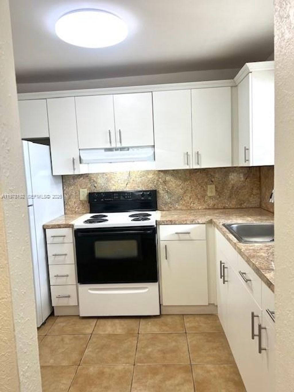 Photo of 5100 SW 64th Ave #105, Davie, FL 33314 (MLS # A11978192)