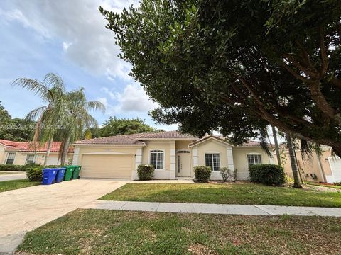 Photo of 10492 SW 20th St, Miramar, FL 33025 (MLS # A12015261)