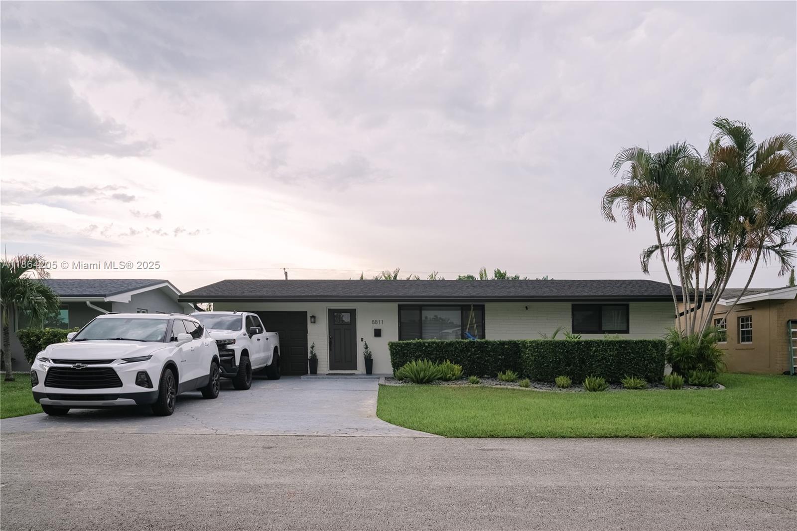 Welcome to your own slice of paradise in Pembroke Pines! This beautifully maintained home with 1 car garage and great flex room perfect for a den, office or possible 3rd bedroom is move-in ready. Located in a non-HOA community. From the moment you arrive, you'll notice the meticulously landscaped front yard and large stamped concrete driveway. Hurricane impact windows, doors & garage door provide peace of mind. Upgraded kitchen w/granite countertops and stainless steel appliances. New roof and flat roof (2023). Sit back & relax in your patio under your pergola enjoying your spacious fenced-in backyard. Bright & open floor plan that is perfect for entertaining. New air conditioning (2019). Gutters throughout (2023). Plantation shutters (2024).Backroom/office new cabinets (2024).A MUST SEE!