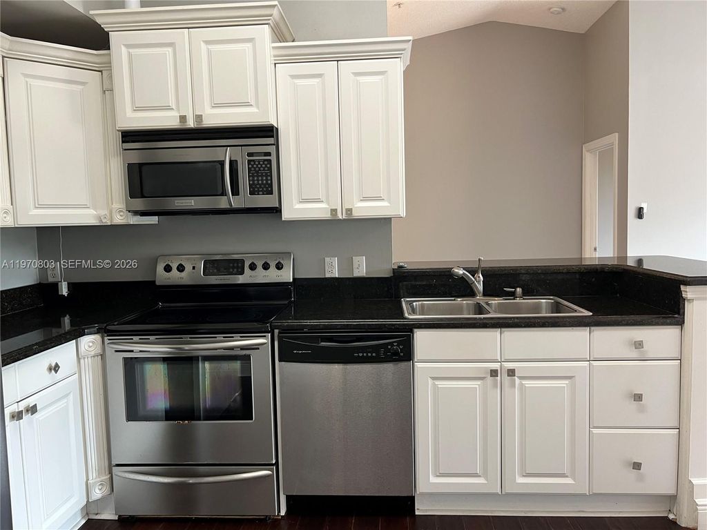 Photo of 6928 SW 39th St #A303, Davie, FL 33314 (MLS # A11970803)