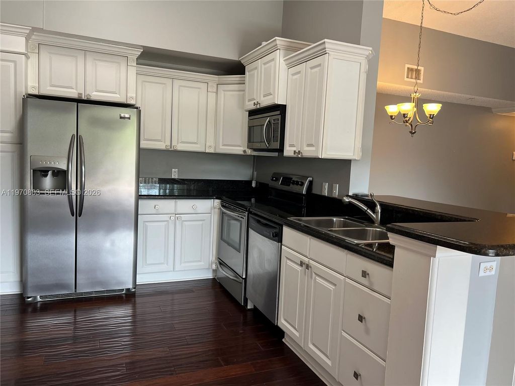 Photo of 6928 SW 39th St #A303, Davie, FL 33314 (MLS # A11970803)