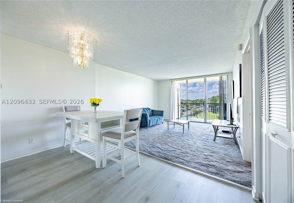 Photo of 3301 NW 47th Ter #403, Lauderdale Lakes, FL 33319 (MLS # A12096432)