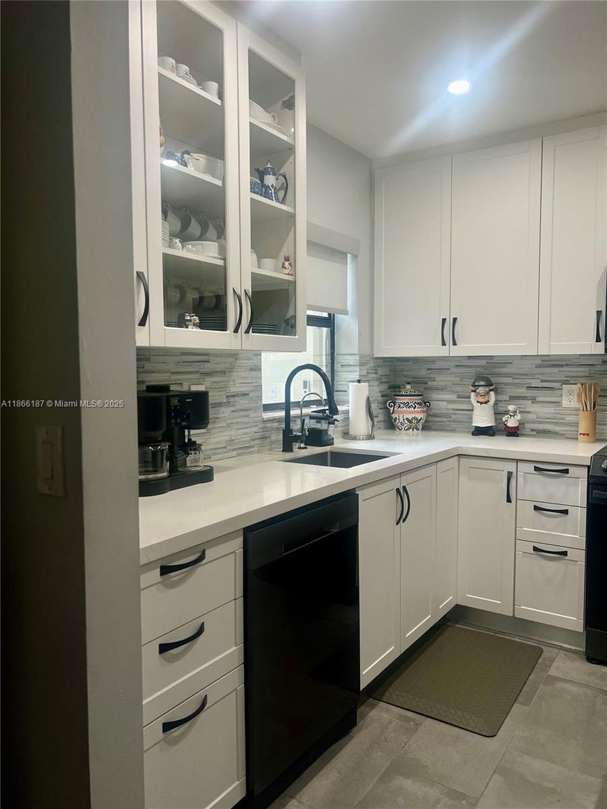 RENOVATED and spacious 2 Beds | 2 Baths condo at the Township in Coconut Creek. It has a beautiful kitchen with quartzito counter top and high end appliances, full side W/D, large screened patio and master bedroom walk-in closet. Attic ceiling space
Applewood is part of the Township community - the residents have access to the Resort Style amenities, GYM, pool, tennis court. Tradewinds Parks is nearby to enjoy many family activities. 
Just a few blocks to major grocery stores and just a few minutes access to I-95 and Turnpike.