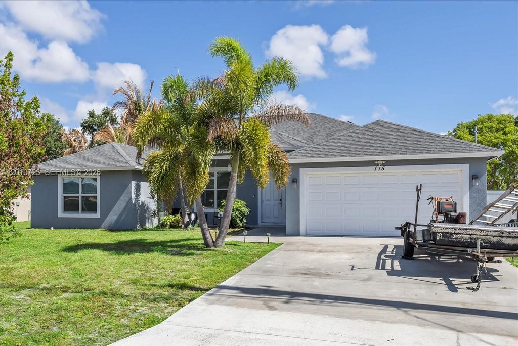Photo of 115 SW Glenwood Dr, Port St Lucie, FL 34984 (MLS # A12010723)