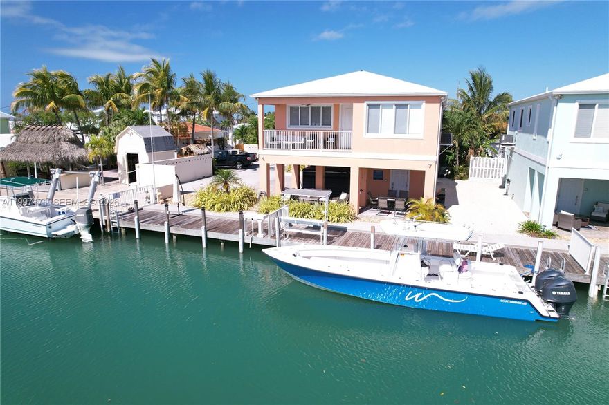 Amazing opportunity in the heart of Marathon, FL with full ocean access view. Brand new construction - Rental & Airbnb okay. Beautiful home completely furnished, ready to enjoy, Jacuzzi and Jetski availability. 5 mins airport access.