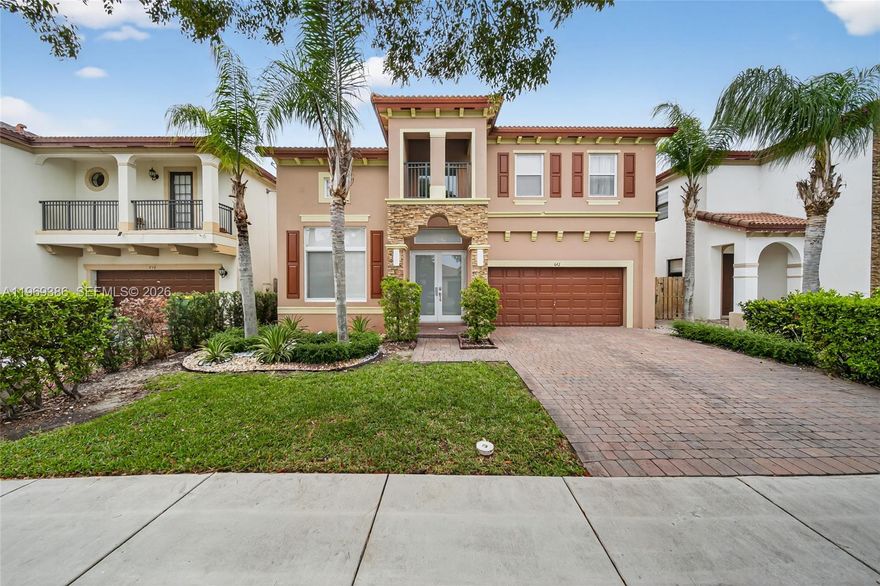 Welcome to this stunning 5-bed, 3- full bath home with BRAND NEW HURRICANE IMPACT WINDOWS and DOORS, located in the highly sought-after community of Mallorca at The Vineyards. This residence offers a bright, open floor plan with 20 Foot high ceilings,FIRST FLOOR includes a bedroom and full bath, ideal for guests or multigenerational living. Upstairs you'll find a spacious loft, along with the primary suite featuring dual walk-in closets, double vanities, and a separate soaking tub and shower. Living in The Vineyards means enjoying resort-style amenities such as yard maintenance, beautiful clubhouse, fitness center, playground's, large water park, and a sparkling community pool conveniently located near top-rated schools, shopping, dining, Homestead Hospital, and easy access to the Florida Turnpike.