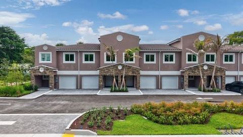 Photo of 1563 NW 94th Way #09, Coral Springs, FL 33071 (MLS # A11831306)