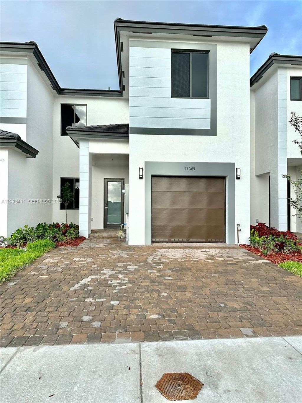 Photo of 13665 SW 157 Ct #13665, Miami, FL 33187 (MLS # A11993411)