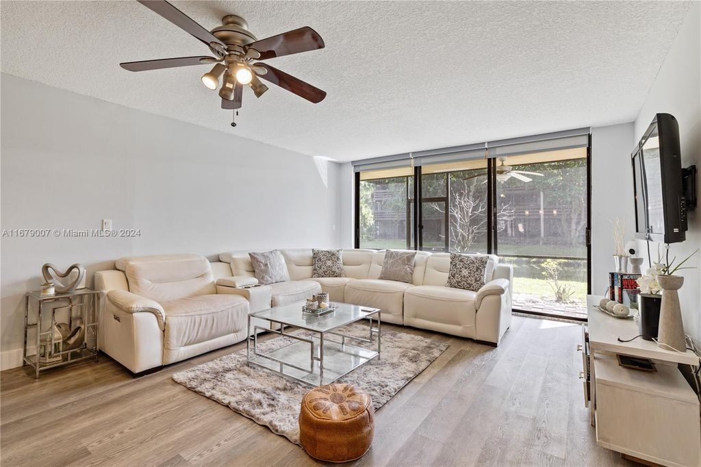 Photo of 120 SW 96th Ter #102, Plantation, FL 33324 (MLS # A11679007)