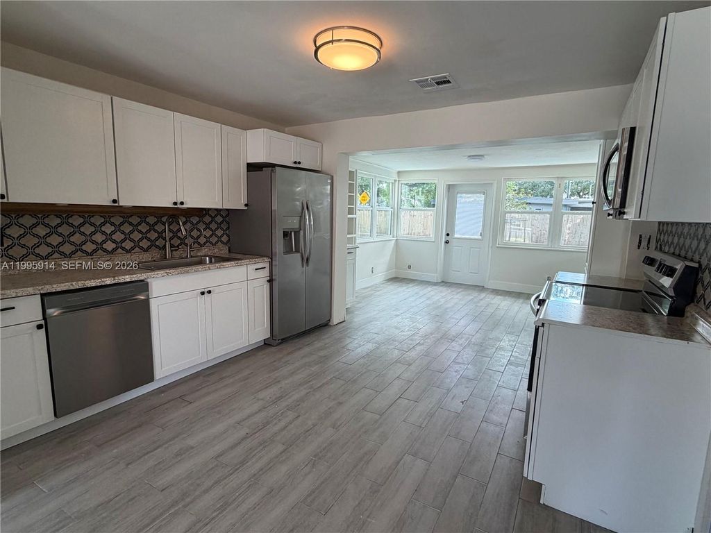 Photo of 6604 Raleigh St, Hollywood, FL 33024 (MLS # A11995914)