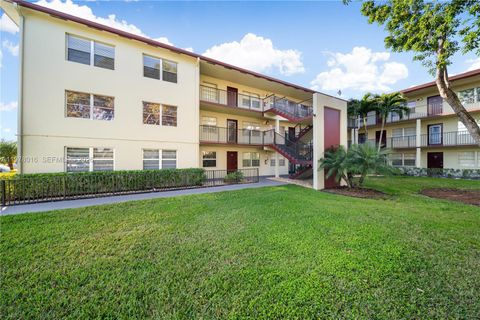 Photo of 13455 SW 3rd St #302S, Pembroke Pines, FL 33027 (MLS # A11978016)