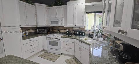 Tiny photo for 16461 SW 103 Terrace, Miami, FL 33196 (MLS # A12074747)