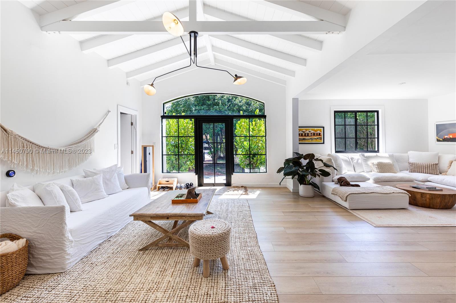 Charming 4 bed / 3 bath Miami Beach home originally designed by Carlos Schoeppl. Classic one-story design with a comfortable open layout, large great room with exposed beamed ceilings, and great light from many windows. A large pool and expansive backyard surrounded by mature landscape make for the ideal private entertaining and recreational area. Nicely renovated with new bathrooms, flooring, kitchen, and impact windows. Located on a desirable low-traffic street within walking distance of 41st Street and the ocean.