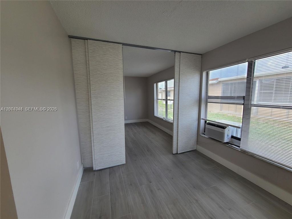 Photo of 4751 NW 12th Dr #1, Deerfield Beach, FL 33064 (MLS # A12011041)