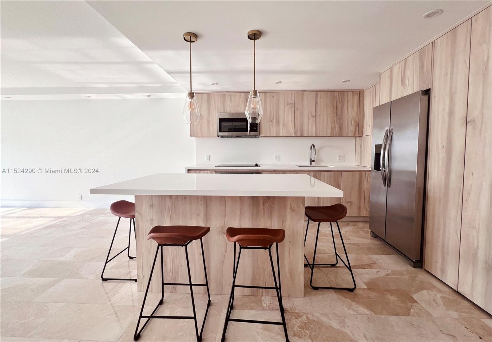 Stunning bay views in this sun-filled, impeccably remodeled 1 bedroom and 1.5 baths unit at Brickell Place.  Located in the quiet sector of Brickell next to the Key Biscayne entrance and a short walk to Brickell City Center, Brickell's financial center and many restaurants. Beautiful and well-appointed new kitchen features an island, new appliances and custom features. Open floor plan, marble floors, electric custom blinds and dimmers throughout the unit. Custom walking closet and washer & dryer inside the unit. The open balcony has an endless view of the bay! Building offers great amenities including an oversized pool, hot tub, bbq area, gym, tennis, pickle ball and racketball courts and a space for paddle boards. No pets and no smoking. Available now.