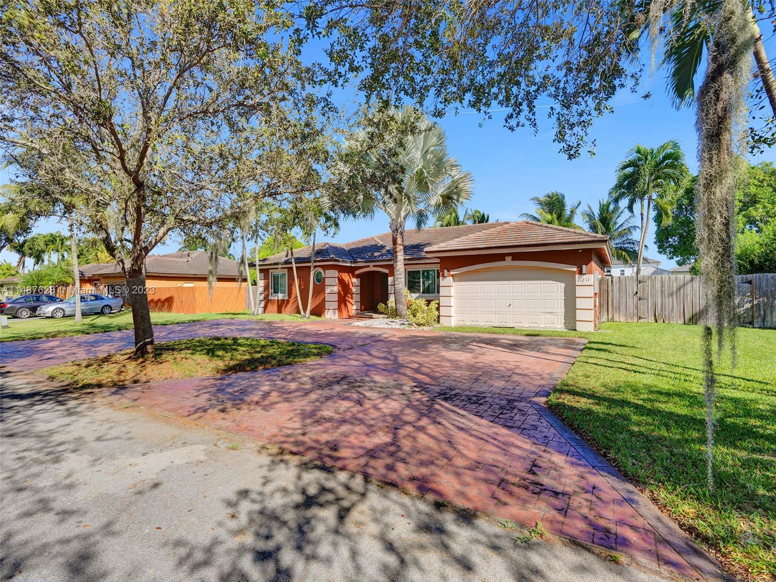 Check out this Spacious 3-bedroom, 2-bath pool home with over 2,000 square feet of living space. Situated on a lot that is almost 13,000 square feet, this residence boasts vaulted ceilings, tile flooring throughout, a convenient 2-car garage, an open patio, and a shed. Additionally, there is ample space for a boat or RV. The roof is just 2 years old, and the home features impact windows and doors.