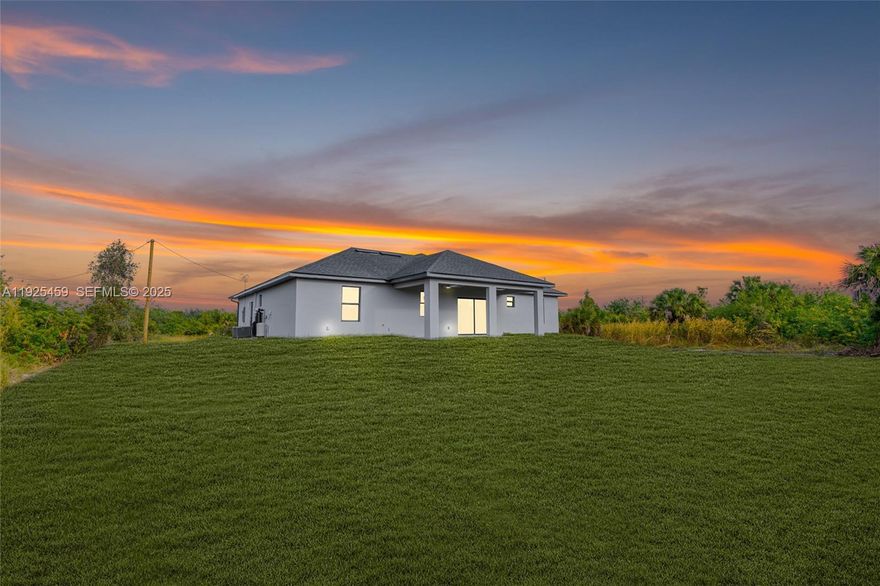 Brand-new 2025 construction! This beautifully designed 3 bedroom, 2 bathroom home offers 1,387 sq ft of living area and 2,115 total sq ft. Featuring concrete block construction, shingle roof, impact-resistant openings (per plan), and modern finishes throughout. Enjoy an open-concept layout with a spacious great room, dining area, and a bright kitchen with island, tile floors in wet areas, and 9’4” ceilings in main areas.The master suite includes a walk-in closet and a modern bathroom with walk-in shower. Home also includes a covered lanai, laundry room inside, and a 2-car garage.Located in a fast-growing area of Lehigh Acres with new construction all around.Seller is offering closing cost assistance with a strong offer!Perfect for first-time buyers, investors, or anyone looking for a low-maintenance new build ready to close.