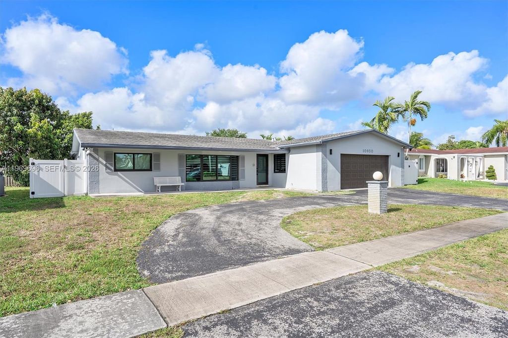 Photo of 10950 NW 16th Ct, Pembroke Pines, FL 33026 (MLS # A11969696)