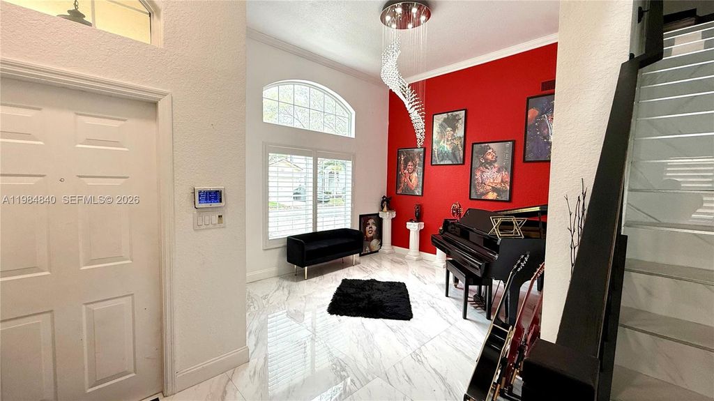 Photo of 7500 NW 19th Dr, Pembroke Pines, FL 33024 (MLS # A11984840)